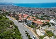 Купить Роскошная вилла с панорамными видами на море и замок в Алании – район Кучукхасбахче 9 