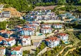 Купить Просторный меблированный дуплекс с видовыми характеристиками в престижном районе Алании - Бекташ 3 