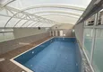 Купить Смежная триплекс вилла в районе Каргыджак, с мебелью в коттеджном комплексе 12 