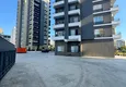 Купить Трехкомнатная квартира с видом на море и горы в современном комплексе – Мерсин, район Томюк 16