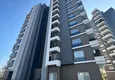 Купить Трехкомнатная квартира с видом на море и горы в современном комплексе – Мерсин, район Томюк 18