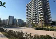 Купить Трехкомнатная квартира с видом на море и горы в современном комплексе – Мерсин, район Томюк 3