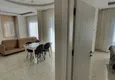 Доступная покупка Квартира 1+1 в Махмутларе с мебелью и видом на горы  3 
