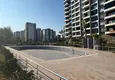 Купить Трехкомнатная квартира с видом на море и горы в современном комплексе – Мерсин, район Томюк 4
