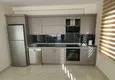 Доступная покупка Квартира 1+1 в Махмутларе с мебелью и видом на горы  5 