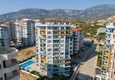 Купить Срочная продажа! Квартира 1+1 с мебелью в современном комплексе, район Махмутлар – Алания 1