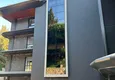 Купить Трехкомнатная квартира с выходом в сад в элитном комплексе – центр Алании, район Бююк Хасбахче 9