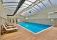 Купить Двухуровневая Twin Villa в элитном эко-комплексе – район Каргыджак, Алания 11 