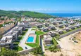 Купить Двухуровневая Twin Villa в элитном эко-комплексе – район Каргыджак, Алания 1 