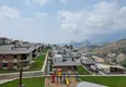 Купить Двухуровневая Twin Villa в элитном эко-комплексе – район Каргыджак, Алания 2 