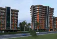 Купить Панорамные виды и комфорт – квартиры 1+1 и 2+1 в стильном комплексе, Махмутлар, Алания 1 
