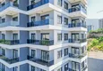Купить Двухкомнатная квартира с чистовой отделкой с видом на море и горы в Алании, район Махмутлар 5