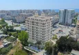 Купить Квартиры 1+1 в центре Махмутлара, всего в 550 метрах от моря 1