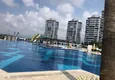 Купить Двухкомнатная квартира с видом на море в Мерсине, район Эрдемли, микрорайон Чешмели  1 
