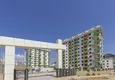 Купить Двухкомнатная квартира в новом комплексе - Алания, район Авсаллар 2