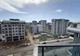 Доступная покупка Квартира 2+1 в Махмутларе с видом на горы в жилом комплексе отельного уровня 21 