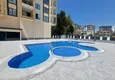 Купить Квартиры 1+1 в центре Махмутлара, всего в 550 метрах от моря 3