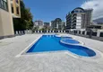 Купить Квартиры 1+1 в центре Махмутлара, всего в 550 метрах от моря 4