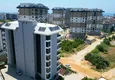 Купить Угловая квартира 1+1 с чистовой отделкой в современном комплексе - район Авсаллар, Алания 1 