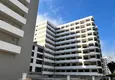 Купить Квартиры в Мерсине, район Томюк - от инвестора на этапе строительства. Подходит для краткосрочной аренды 6 