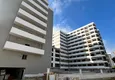 Купить Квартиры в Мерсине, район Томюк - от инвестора на этапе строительства. Подходит для краткосрочной аренды 7 