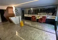 Купить Меблированная квартира 1+1 с видом на море в элитном комплексе - Каргыджак, первая береговая линия 17 