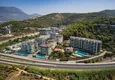 Купить Меблированная квартира 1+1 с видом на море в элитном комплексе - Каргыджак, первая береговая линия 2 