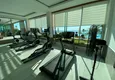 Купить Меблированная квартира 1+1 с видом на море в элитном комплексе - Каргыджак, первая береговая линия 23 