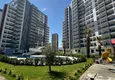 Купить Инвестиционное предложение в Мерсине — квартира 1+1 в строящемся комплексе комфорт-класса 1