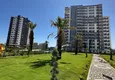 Купить Инвестиционное предложение в Мерсине — квартира 1+1 в строящемся комплексе комфорт-класса 3