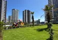 Купить Инвестиционное предложение в Мерсине — квартира 1+1 в строящемся комплексе комфорт-класса 4