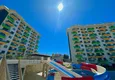 Купить Садовый дуплекс с полной чистовой отделкой в районе Авсаллар, Алания 5