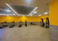 Купить Садовый дуплекс с полной чистовой отделкой в районе Авсаллар, Алания 11