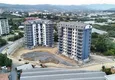 Купить Роскошные квартиры с рассрочкой до 18 месяцев в комплексе курортного формата - район Авсаллар, Алания 1