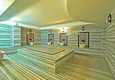 Купить Двухуровневый пентхаус 2+1 с мебелью и видом на море в центре Махмутлара 11 