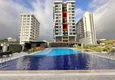 Купить Квартира 2+1 с мебелью, застекленным балконом и видом на море в центре Махмутлара, Алания 2 