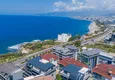 Купить Линейная квартира 4+1 на первой береговой в Алании, район Каргыджак – под гражданство 5 