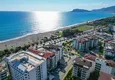 Купить Квартира 1+1 с собственным садом в элитном комплексе на первой береговой линии – Алания, район Кестель 4 