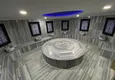 Купить Элитный триплекс-пентхаус с авторским дизайном в Алании, район Махмутлар 16