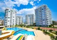 Купить Элитная квартира 3+1 на первой линии в Тосмуре, Алания — линейная планировка, мебель, вид на море 1 