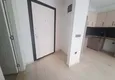 Доступная покупка Новостройки Алании - Двухкомнатная квартира в Махмутларе, с чистовой отделкой  1 