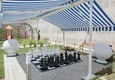Купить Дуплекс 4+1 с садом в Каргыджаке — меблированный, в элитном комплексе 13 