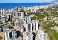 Купить Квартира 2+1 в Махмутларе с видом на горы в жилом комплексе отельного уровня 4 