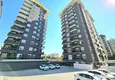 Купить Квартира 2+1 в Алании, район Махмутлар - новая мебель и вид на море 13 