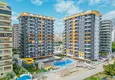 Купить Квартира 2+1 в Алании, район Махмутлар - новая мебель и вид на море 1 
