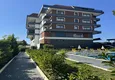 Купить Квартира 1+1 с мебелью в Алании, Кестель - 150 м до моря, застекленный балкон  7 
