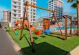 Купить Новый многоквартирный жилой комплекс в районе Махмутлар, Алания  16 