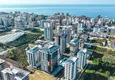 Купить Новый многоквартирный жилой комплекс в районе Махмутлар, Алания  1 