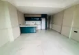 Доступная покупка Двухуровневые апартаменты 2+1 в Конаклы - с террасой у бассейна в элитной резиденции 4 