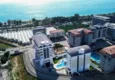 Купить Дуплекс 2+1 в Каргыджаке, 250 метров от пляжа - двухуровневый пентхаус с видом на море 2 